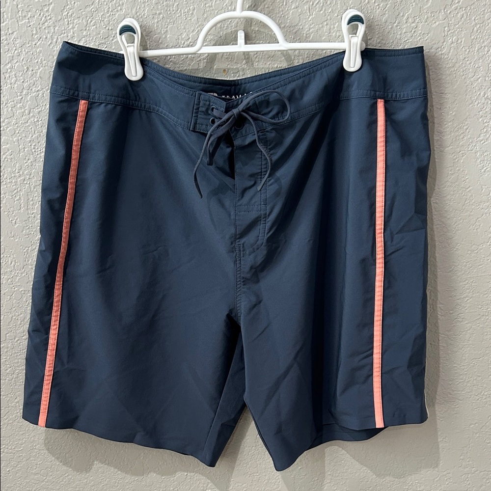 Travis Mathew Navy Swim Board Shorts with Coral Side Stripes